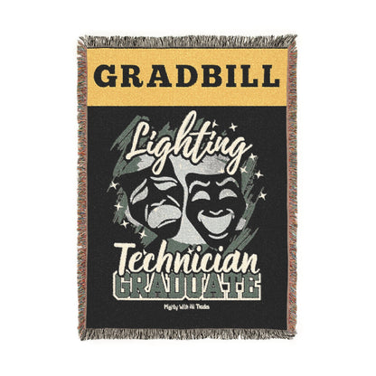 Woven blanket with 'Gradbill' branding and theatrical design on a black background