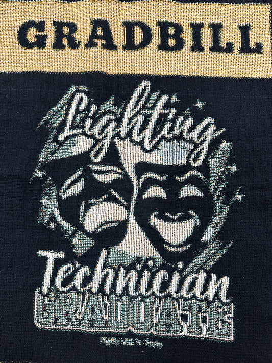 woven blanket with 'Gradbill' text and theatre design on a black background