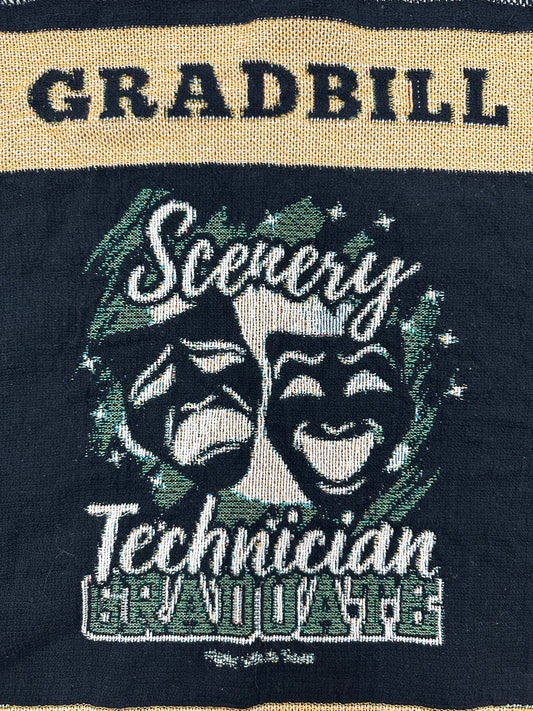 woven blanket with 'Gradbill' text and theatre design on a black background