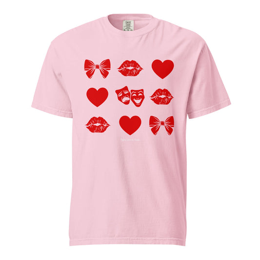 Pink t-shirt with red theatre graphics on a white background