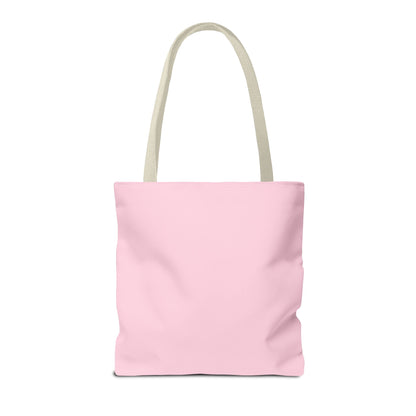 Pink tote bag with beige handle on a white background