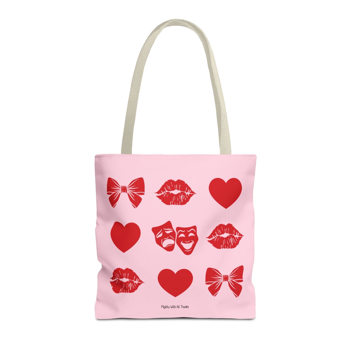 Pink tote bag with red theatre graphics on a white background