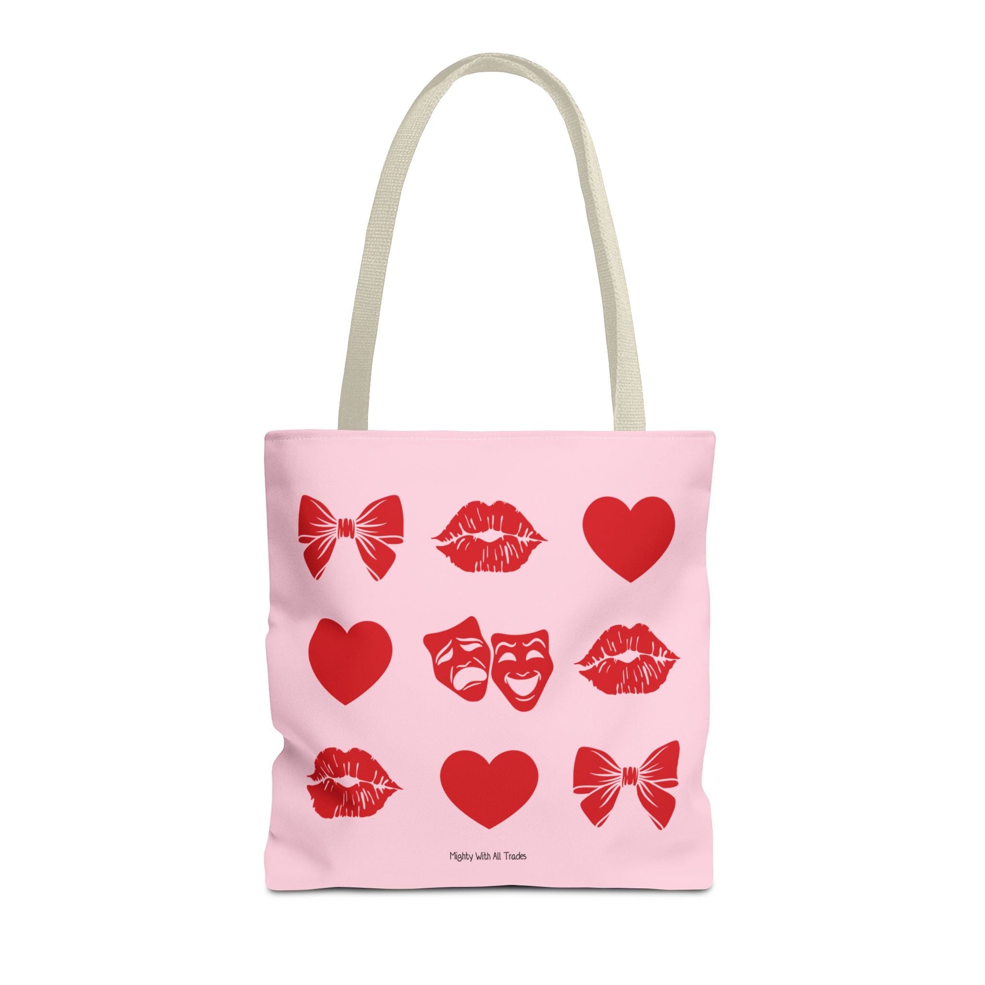 Pink tote bag with red theatre graphics on a white background