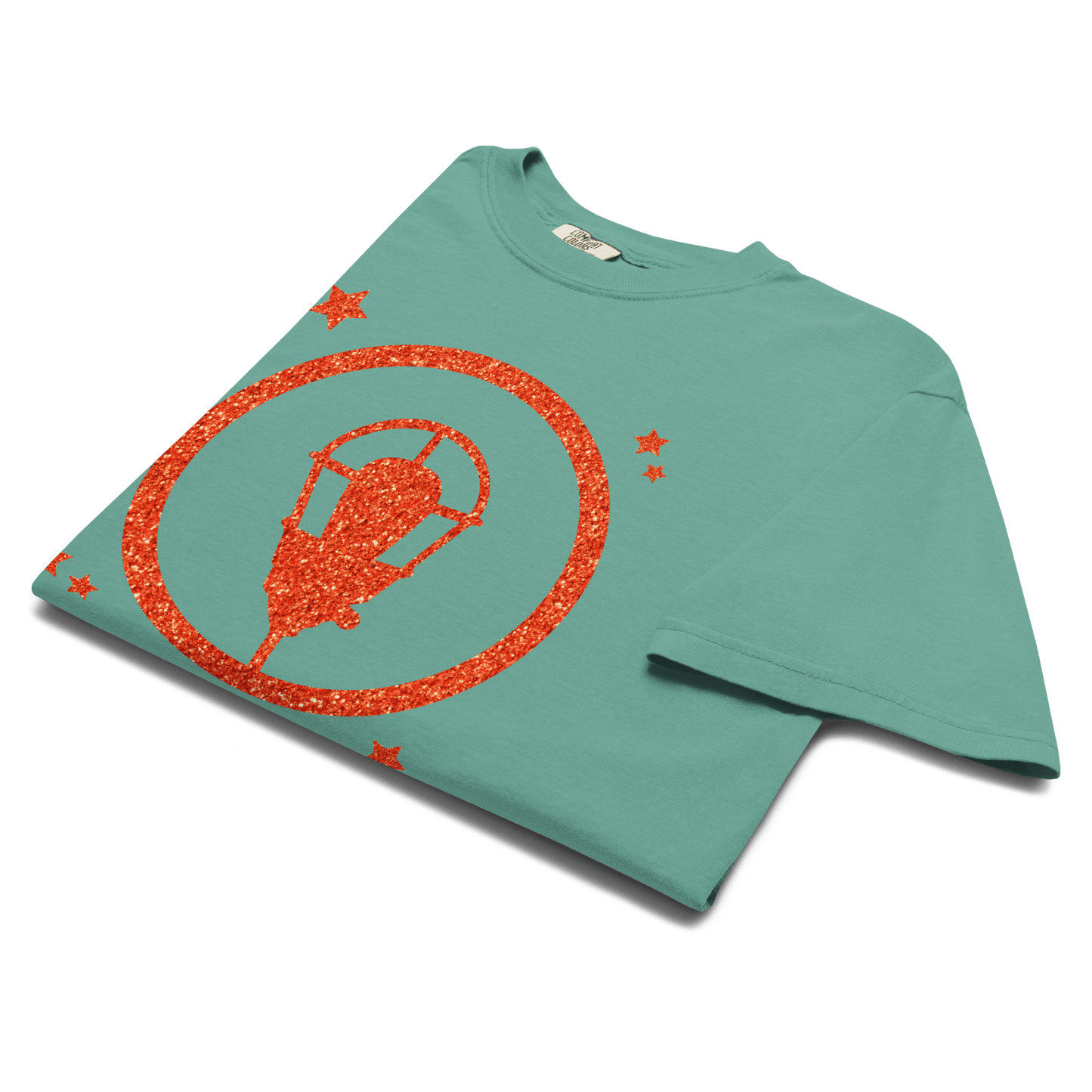 Green t-shirt with orange glitter ghostlight graphic design on a white background