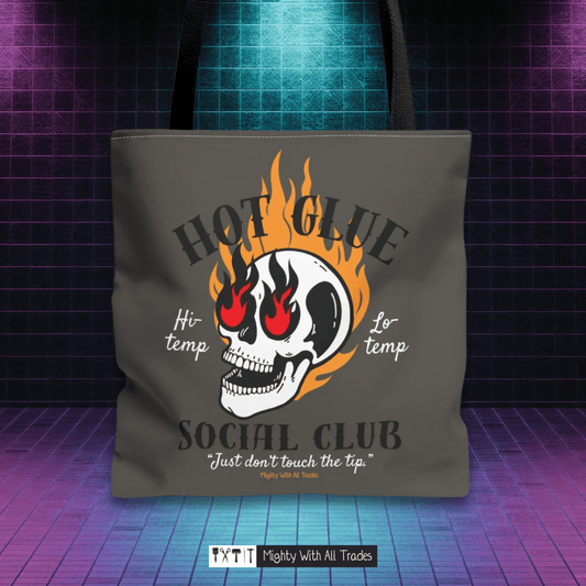 Tote bag with skull design and hot glue social club text on a retro grid background