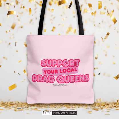 Pink tote bag with 'Support Your Local Drag Queens' text on a confetti background