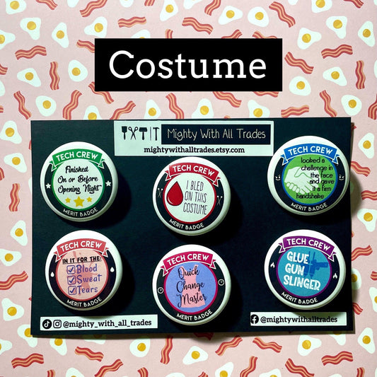 costume tech button collection on a card on a bacon background