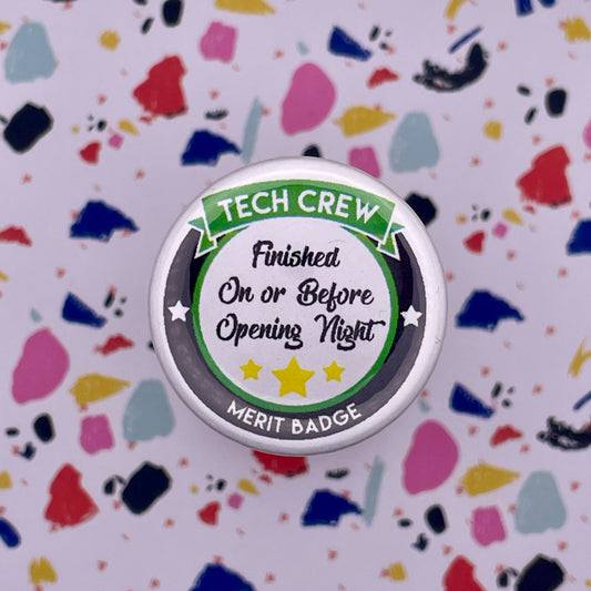 round button with stars for opening night gifts on a colorful background